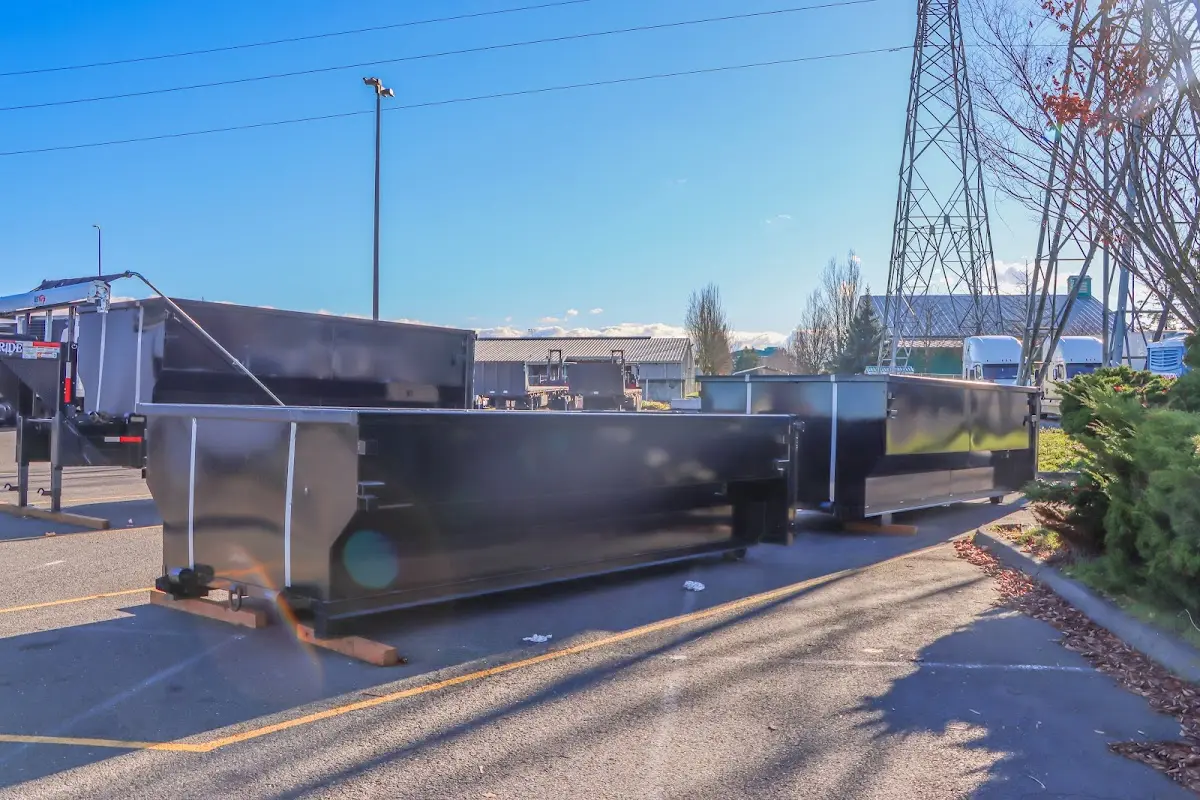 Roll-off dumpster ready for waste disposal at job site for 2 Yard Dumpster Rental in Mount Olive